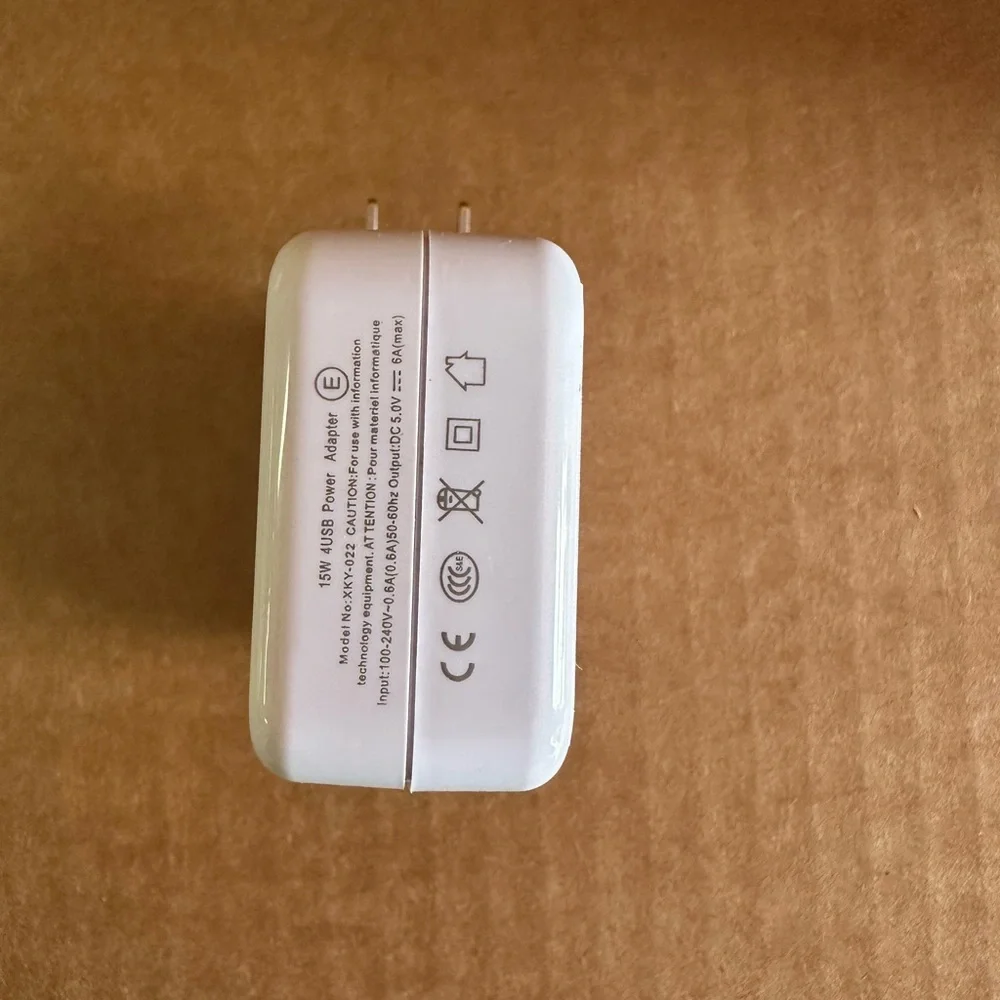 Adapter with 4 USB ports with foldable prongs